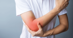 woman-having-elbow-ache-due-to-lateral-epicondylit-2022-11-07-22-25-54-utc1